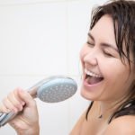 Singing in the shower.